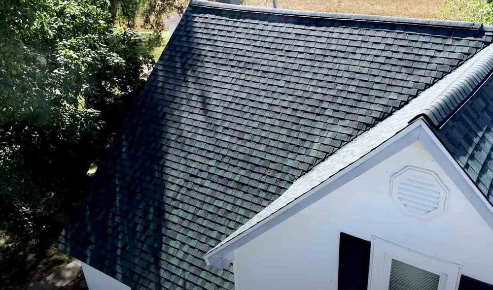 Slide of Legends Roofing Company