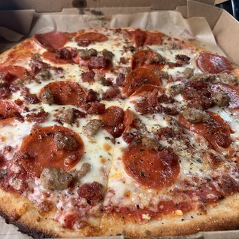 MOD Pizza - Pepperoni,sausage,bacon with chopped garlic and oregano with olive oil sprinkled on top. What a tasty pizza - Fast Food Near Me - Riverside, California