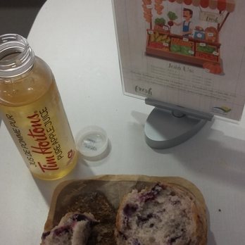 Tim Hortons - a plate of blueberry muffins and a jar of honey - Coffee & Tea Near Me - Oakville, Ontario Tim Hortons - a plate of blueberry muffins and a jar of honey - Coffee & Tea Near Me - Oakville, Ontario