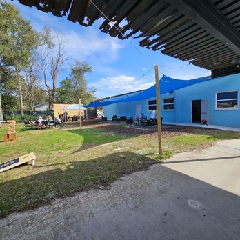 Cider A1A - a blue building with a blue tarp - Cideries Near Me - Fernandina Beach, Florida