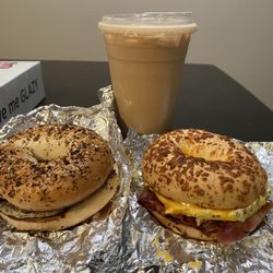 Rebels Dough Joe - Asiago bagel with bacon,egg and cheese. Everything bagel with bacon and egg and a delicious iced vanilla latté