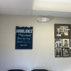 The original Hairlines Barbershop sign on Bloomfield avenue in Flemington