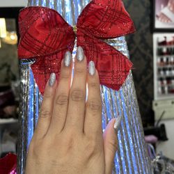 Tina's OPI Nail Spa - Medium Gel-X silver pearl mani w/glitter specks and glitter outline.