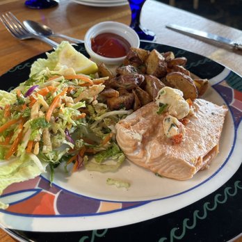 Anthony's Restaurant - Salmon with potato wedges and a coleslaw salad - Seafood Near Me - Bellingham, Washington