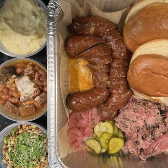 Ruff House BBQ - Hot links with pepper Jack, pulled pork, mashed potatoes, brisket in beans, and esquite corn - Barbeque Near Me - Ventura, California