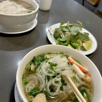 Saigon Brothers - Seafood pho regular size and combo large size in the back - Vietnamese Near Me - Northridge, California Saigon Brothers - Seafood pho regular size and combo large size in the back - Vietnamese Near Me - Northridge, California