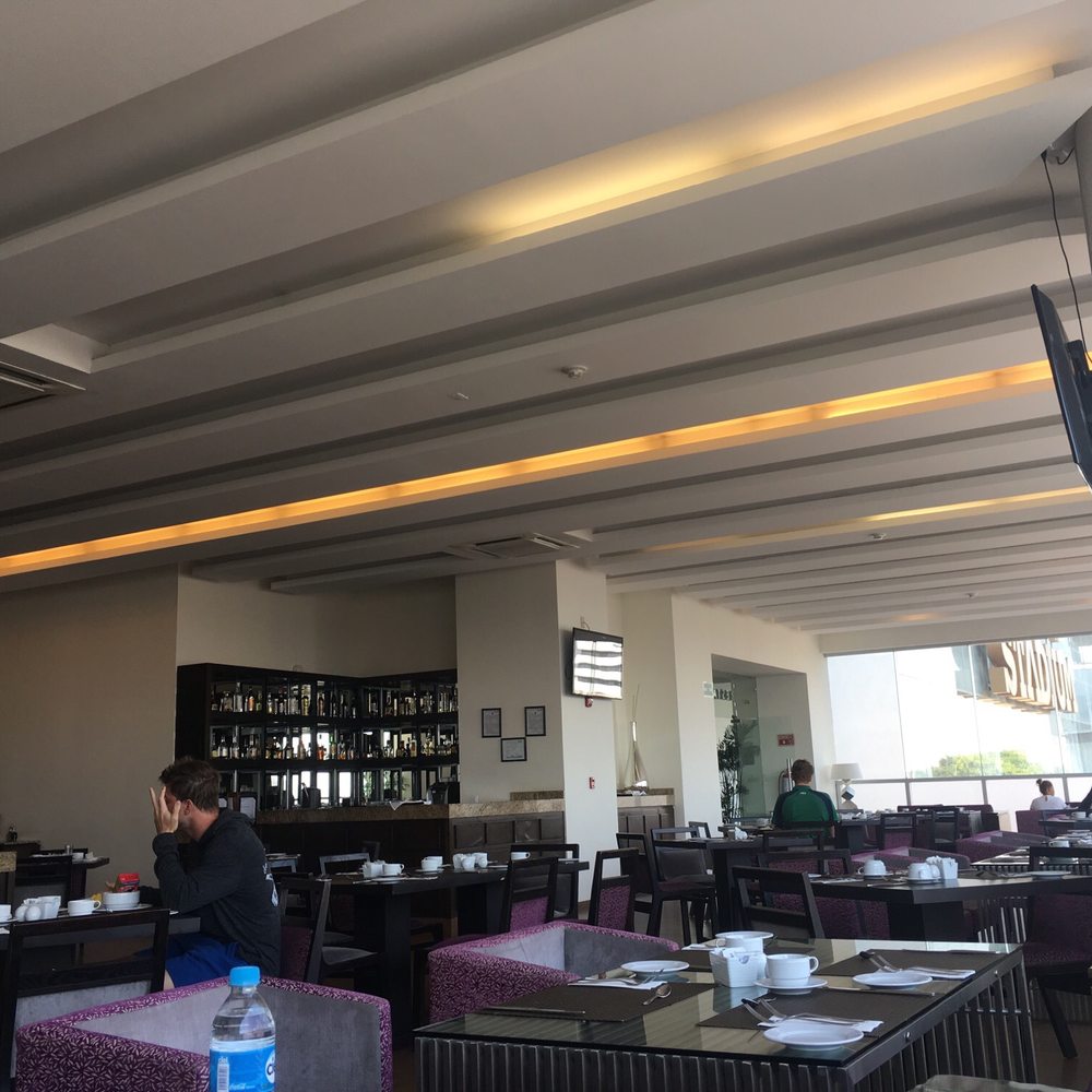 Hotel Stadium - Picture of the restaurant set up for breakfast. I do enjoy  a fresh omelette while reading on a couch - Hotels Near Me - León, GUA
