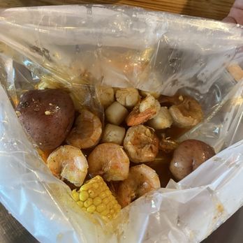Hook & Reel Cajun Seafood & Bar - Half pound scallops half pound shrimp - corn and potatoes included. Fusion sauce - Seafood Near Me - Sacramento, California Hook & Reel Cajun Seafood & Bar - Half pound scallops half pound shrimp - corn and potatoes included. Fusion sauce - Seafood Near Me - Sacramento, California