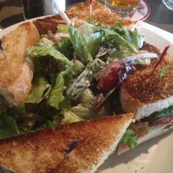 Jersey's Great Food & Spirits - Club sandwich with side salad. - Sports Bars Near Me - Shoreline, Washington