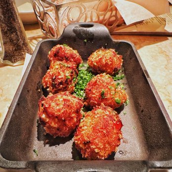 The Cheesecake Factory - Crispy Crab Bites -- Bite-Sized Little Crab Cakes. Served with Mustard Sauce - American Near Me - Cherry Hill, New Jersey The Cheesecake Factory - Crispy Crab Bites -- Bite-Sized Little Crab Cakes. Served with Mustard Sauce - American Near Me - Cherry Hill, New Jersey