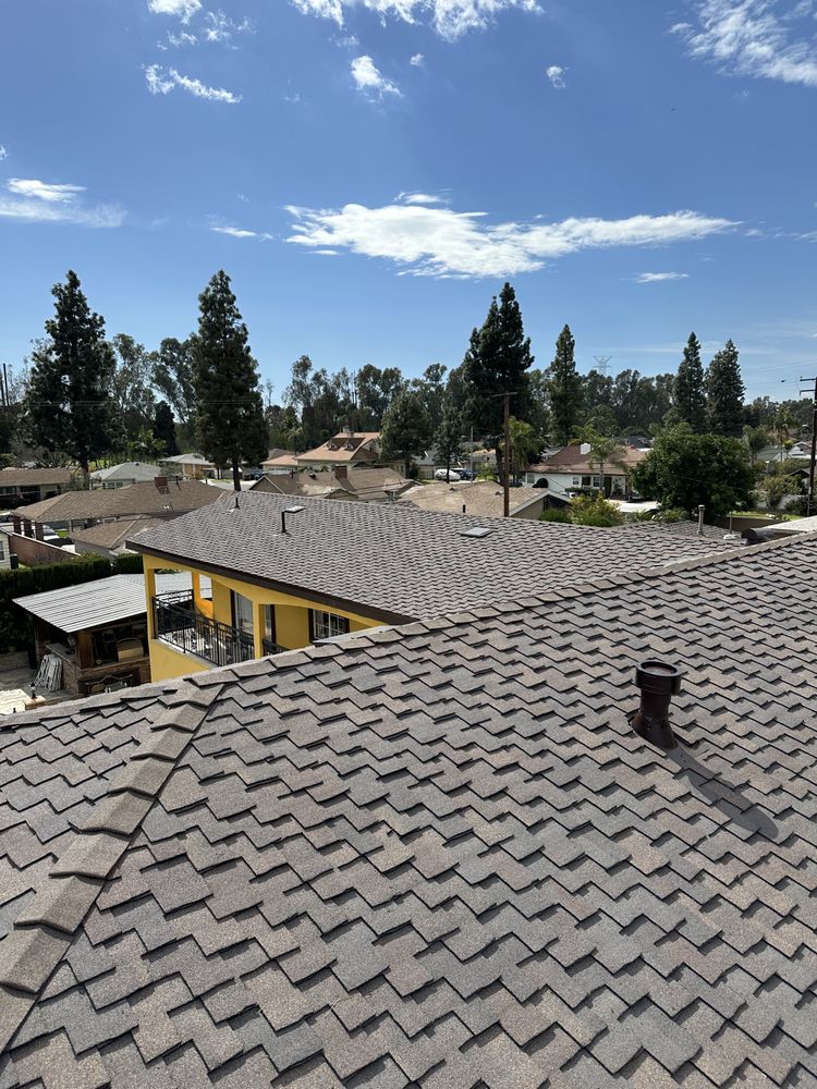 Slide of Alex's Top Roofing