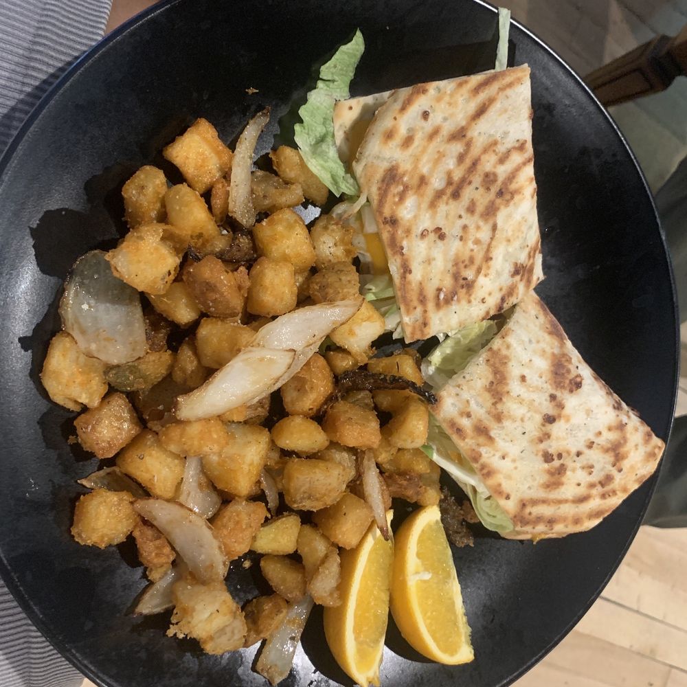 Breakfast sandwich with gluten free bread and breakfast potatoes