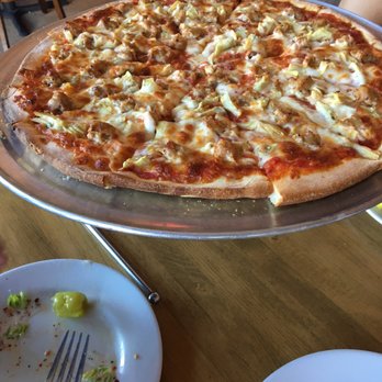 Pinocchio's Pizza - We got a sausage and artichoke pizza. - Pizza Near Me - Pasadena, California Pinocchio's Pizza - We got a sausage and artichoke pizza. - Pizza Near Me - Pasadena, California