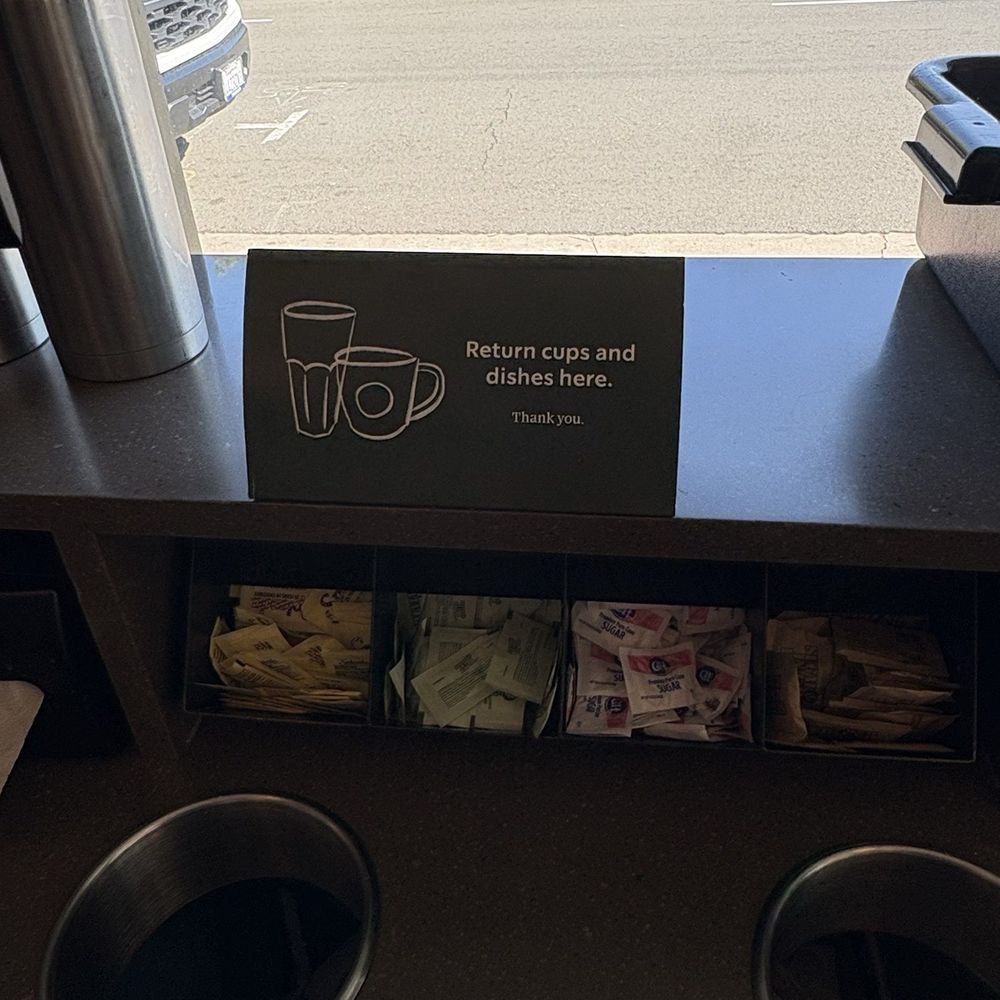 Starbucks - Condiment & trash station sign - Coffee & Tea Near Me - San Diego, California Starbucks - Condiment & trash station sign - Coffee & Tea Near Me - San Diego, California