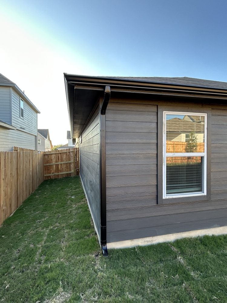 Slide of Gonzalez Seamless Rain Gutters