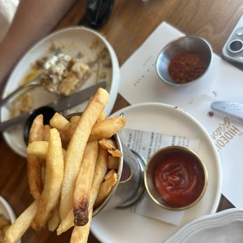 The Hideout Kitchen - "Truffle fries" lol they're just plain fries & when we asked if these were the "truffle fries" they brought this red side - New American Near Me - Lafayette, California The Hideout Kitchen - "Truffle fries" lol they're just plain fries & when we asked if these were the "truffle fries" they brought this red side - New American Near Me - Lafayette, California