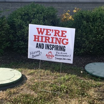Arby's - a we're hiring and inspiring sign in front of a building - Fast Food Near Me - Cumberland, Maryland