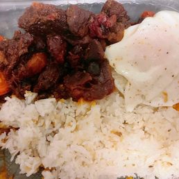 Tosilog (Tocino, garlic rice, and two eggs). Didn't taste any garlic in rice. Tocino a bit too sweet. Eggs are good! Tosilog (Tocino, garlic rice, and two eggs). Didn't taste any garlic in rice. Tocino a bit too sweet. Eggs are good!