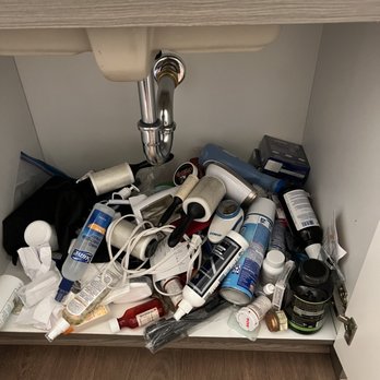 Clutter Storage - They dumped some of my bathroom items on a packing cloth and tied it with tape. - Self Storage Near Me Clutter Storage - They dumped some of my bathroom items on a packing cloth and tied it with tape. - Self Storage Near Me