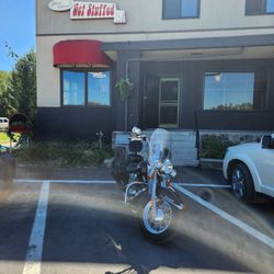 Get Stuffed - The exterior of the cafe. The large saloon is next door to the right.