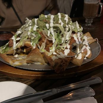 The Irish American Pub - Nachos with chicken, pico de gallo, cheese, guacamole, salsa blanca, fried beans, and jalapeños - Irish Pub Near Me - New York, New York