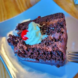 Boca Brava - a slice of chocolate cake with whipped cream - dessert, food - Mexican Near Me - El Paso, Texas
