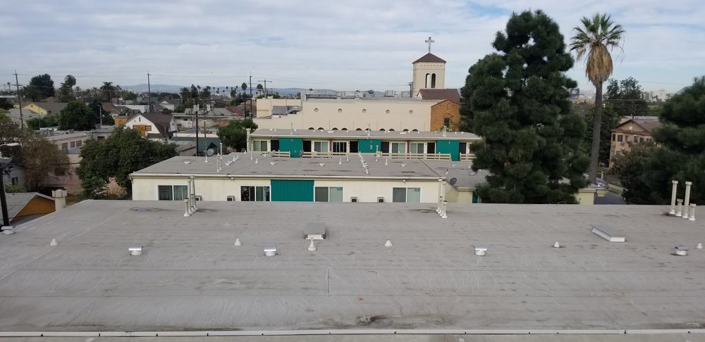 Slide of Genesis Pro Roofing