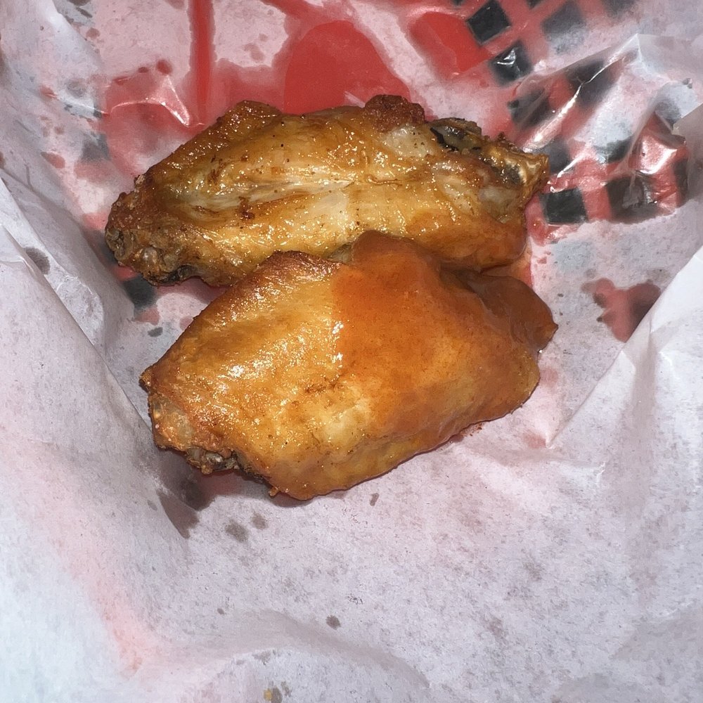Buffalo wings. Sauce on the side. We got a little too anxious to eat before taking pics. Buffalo wings. Sauce on the side. We got a little too anxious to eat before taking pics.