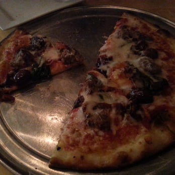 Venture Kitchen And Bar - Rustica pie...lamb & pork sausage, wine-soaked sun dried tomatoes, kalamata olives, red sauce, fresh basil, & mozzarella. - Pizza Near Me - Hampton, Virginia Venture Kitchen And Bar - Rustica pie...lamb & pork sausage, wine-soaked sun dried tomatoes, kalamata olives, red sauce, fresh basil, & mozzarella. - Pizza Near Me - Hampton, Virginia