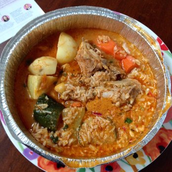 El Chapin - Their chicken en pepian takeout with the rice poured into the stew. Chock full of fresh vegetables and tasty chicken - Latin American Near Me - Durham, North Carolina