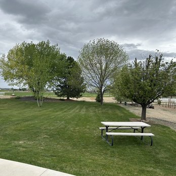 Owyhee Vista Vineyard - a picnic table in a field - Wine Tasting Room Near Me - Kuna, Idaho Owyhee Vista Vineyard - a picnic table in a field - Wine Tasting Room Near Me - Kuna, Idaho