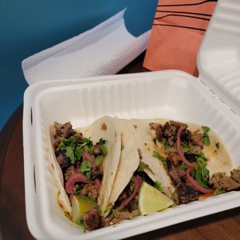 Blackwood BBQ - two tacos in a styrofoam container - Barbeque Near Me - Chicago, Illinois Blackwood BBQ - two tacos in a styrofoam container - Barbeque Near Me - Chicago, Illinois