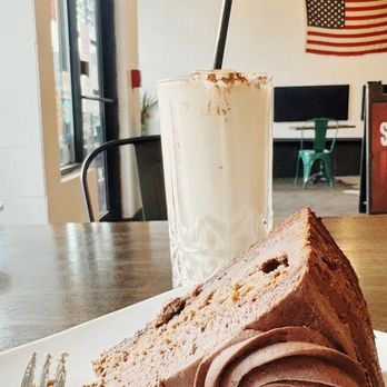 Dessert Oasis Coffee Roasters - Gluten-free brownie cheesecake - Coffee Roasteries Near Me - Royal Oak, Michigan Dessert Oasis Coffee Roasters - Gluten-free brownie cheesecake - Coffee Roasteries Near Me - Royal Oak, Michigan