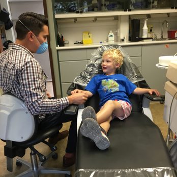 Nathan Wong, DDS - Digital Dentistry - Dr. Wong making sure my son had a positive first dental experience. - General Dentistry Near Me - San Luis Obispo, California Nathan Wong, DDS - Digital Dentistry - Dr. Wong making sure my son had a positive first dental experience. - General Dentistry Near Me - San Luis Obispo, California