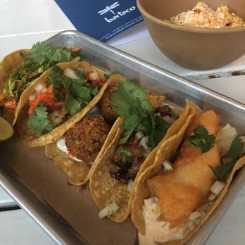 bartaco - Taco "Flight" with Baja Fish, roasted duck, falafel, cauliflower and redfish tacos and a side of corn - Mexican Near Me - Atlanta, Georgia bartaco - Taco "Flight" with Baja Fish, roasted duck, falafel, cauliflower and redfish tacos and a side of corn - Mexican Near Me - Atlanta, Georgia