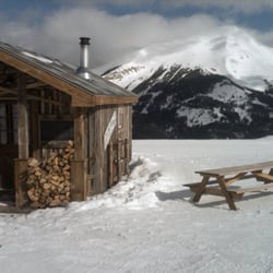 Yellowstone Club - One of the Watering Holes with Lone Peak in the background.