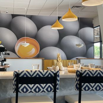 Yolked Kitchen - Bar seating and egg wall decoration - Breakfast & Brunch Near Me - Clovis, California Yolked Kitchen - Bar seating and egg wall decoration - Breakfast & Brunch Near Me - Clovis, California