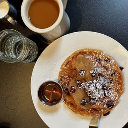 Chicken and Waffles with seasonal fruit compote and coffee. Chicken and Waffles with seasonal fruit compote and coffee.
