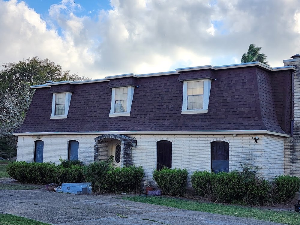 Slide of Reyes Roofing