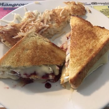 Mangrove Mike's - Brie, raspberry jam, and fried egg grilled cheese with hash browns - Breakfast & Brunch Near Me - Islamorada, Florida Mangrove Mike's - Brie, raspberry jam, and fried egg grilled cheese with hash browns - Breakfast & Brunch Near Me - Islamorada, Florida