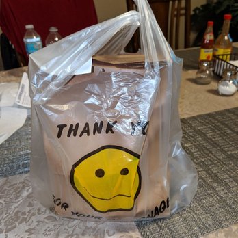 No1 China - a plastic bag with a smiley face on it - Chinese Near Me - Orange Park, Florida