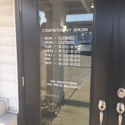 Design Team - Door with schedule and warnings about animals that are pets or solicitors.