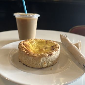The Black Flamingo - Iced coffee with oat milk & a bacon & egg quiche - Coffee & Tea Near Me - Brooklyn, New York The Black Flamingo - Iced coffee with oat milk & a bacon & egg quiche - Coffee & Tea Near Me - Brooklyn, New York