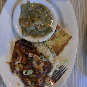 Razzoo's Cajun Cafe - Cajun Fried Chicken, topped with Blackened shrimp. Green Beans, garlic toast and Dirty Rice. - Seafood Near Me - Oklahoma City, Oklahoma Razzoo's Cajun Cafe - Cajun Fried Chicken, topped with Blackened shrimp. Green Beans, garlic toast and Dirty Rice. - Seafood Near Me - Oklahoma City, Oklahoma