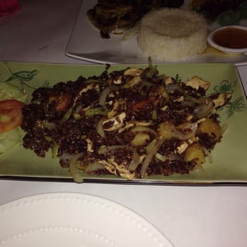 Thai Palace - Bad pic. Sorry. Pineapple fried rice made with red rice. - Thai Near Me - Wolcott, Connecticut