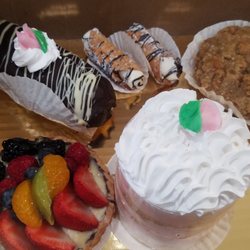 A Sweet Secret Bakery and Cafe - This locally owned & operated bakery & cafe has a beautiful selection of great looking treats. Look at we got for hurricane prep ;-)