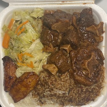 Caribbean Delight - Caribbean Delight ox tail, white rice, plantain, and cabbage. - Caribbean Near Me - North Charleston, South Carolina