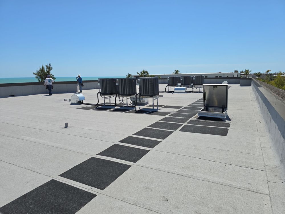 Slide of Rigos Roofing Installers