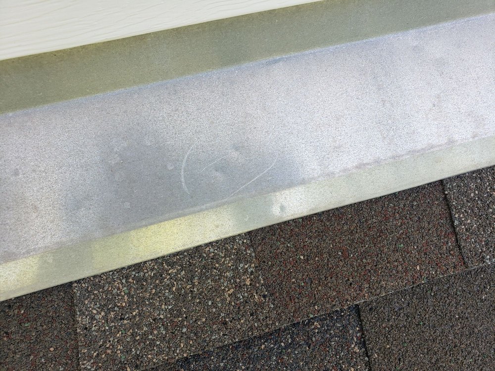 Slide of RainTight Roofing