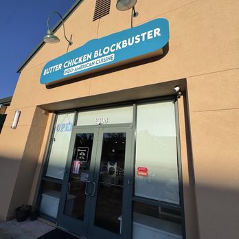 Butter Chicken Blockbuster - Outside front entrance with a new sign - Indian Near Me - Vallejo, California Butter Chicken Blockbuster - Outside front entrance with a new sign - Indian Near Me - Vallejo, California